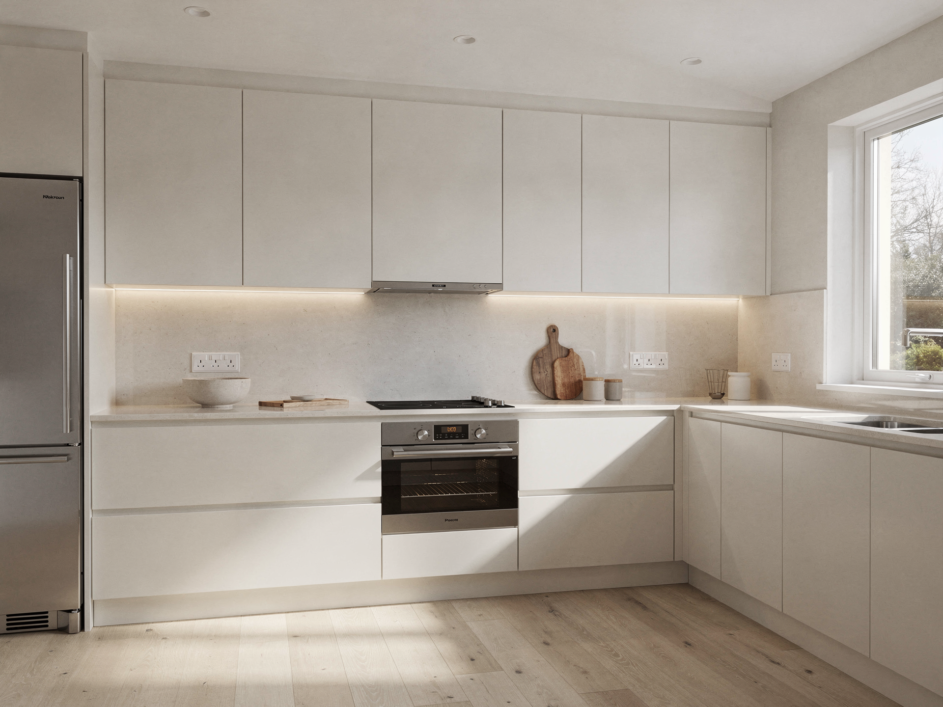 A bright modern kitchen with crisp warm under-cabinet LED lighting along clean counters
